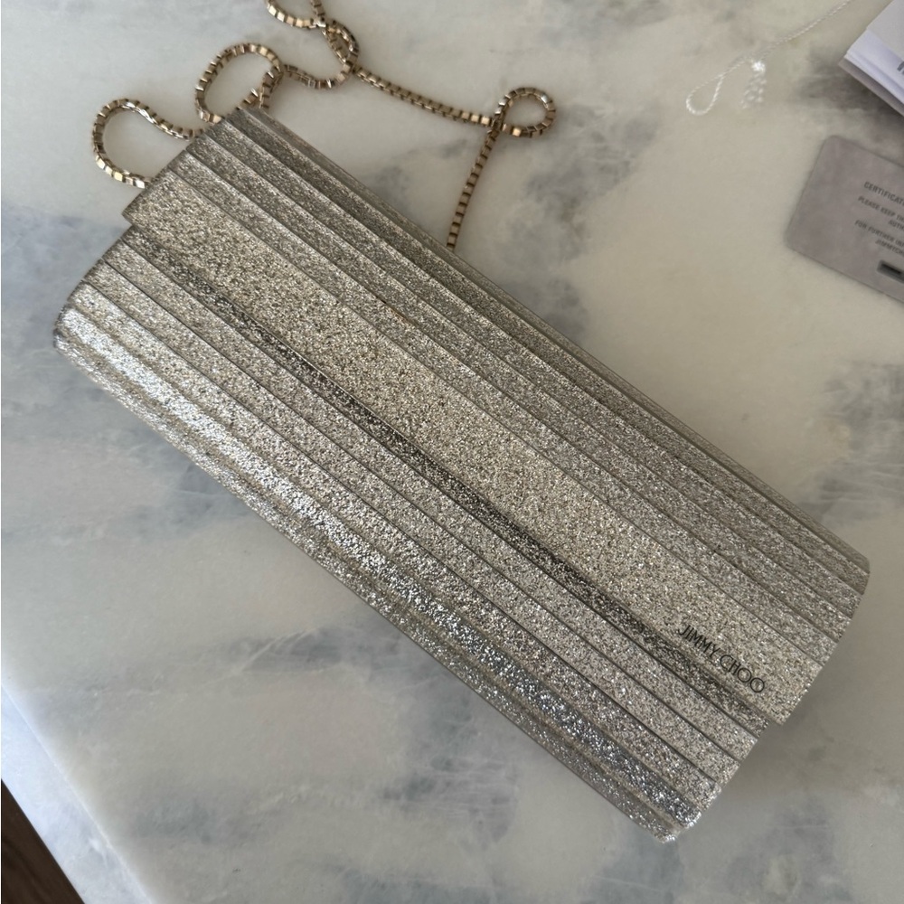 Jimmy Choo Glittering champagne clutch